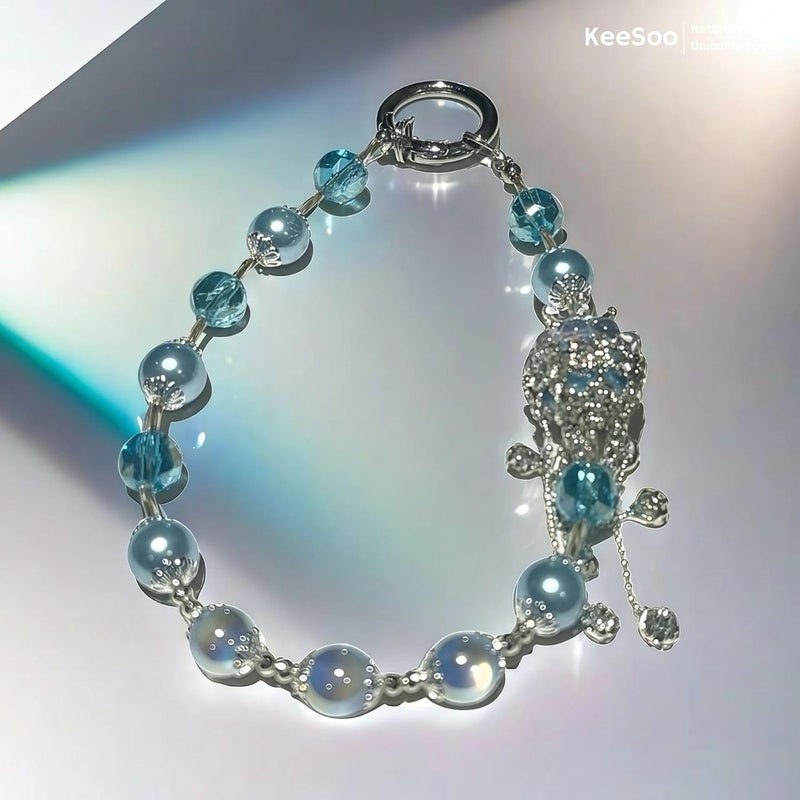 KEESOO Store سحر الهاتف بتصميم أصلي بتاج كريستالي أزرق ملكي مع 2 علامة ربط - أنيق، متين، وسلسلة هاتف بدون استخدام اليدين - متوافق مع آيفون، سامسونج، بيكسل والمزيد - Image 5